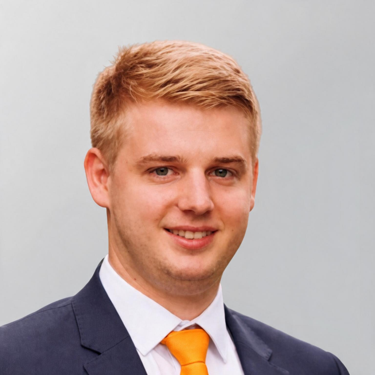 James Greenaway orange tie